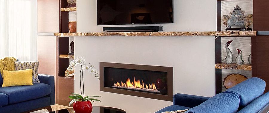 contemporary living room with live edge coffee table and fireplace and mantle